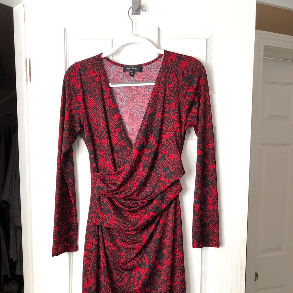 Red and black faux wrap dress.